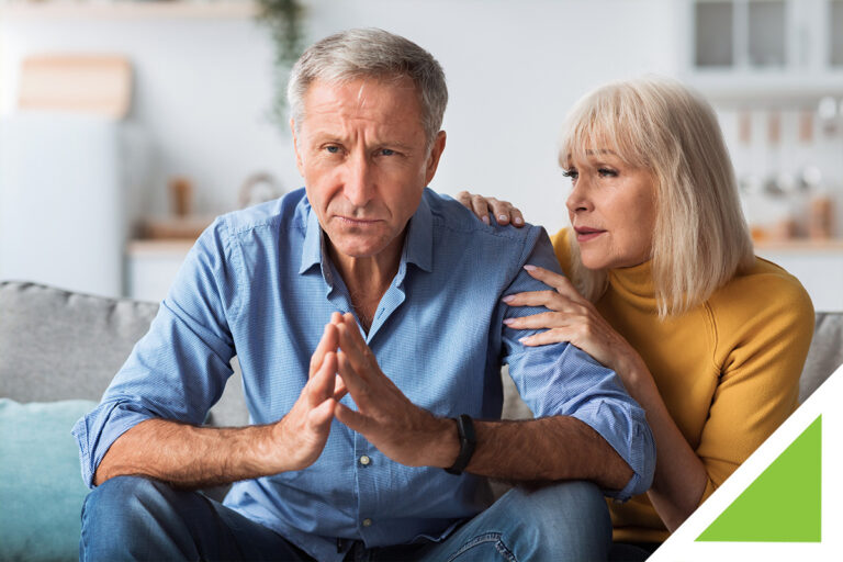 An older couple thinks about retirement planning.